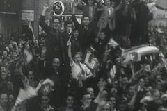 À Genève, l’armistice est fêtée dans l’euphorie dans la rue. Ciné-Journal suisse du 11 mai 1945 À Genève, l’armistice est fêtée dans l’euphorie dans la rue. Ciné-Journal suisse du 11 mai 1945